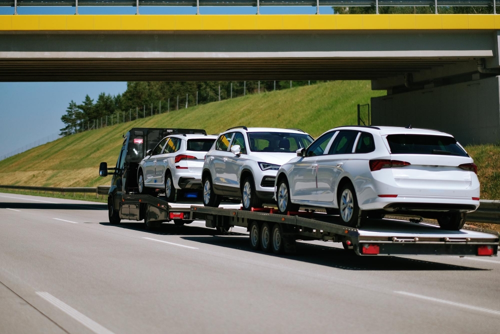 Eagle Cash For Cars loading a vehicle for routing to Alberta recycling partners